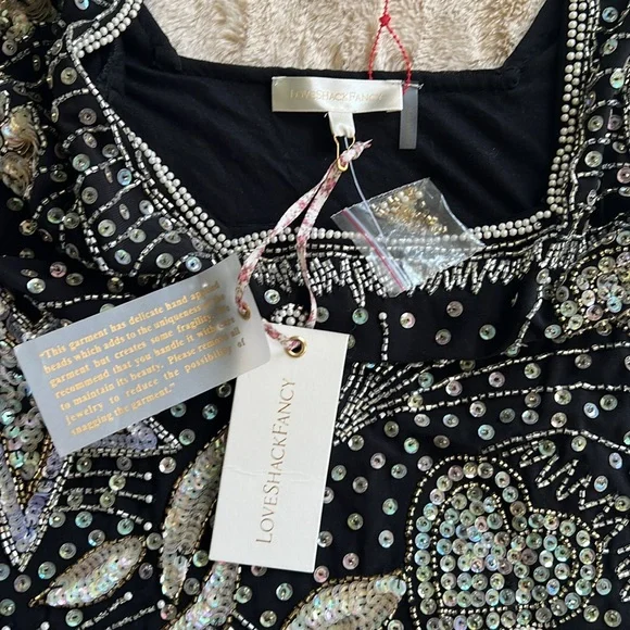 princess polly baby blue dress ✨ LoveShackFancy Sarine Mini Dress ✨ A total showstopper in Pink Starlight  🌸 Hand-embroidered with sequins, beads & crystals in romantic bows and  florals — this dazzling mini was made to turn main image 1